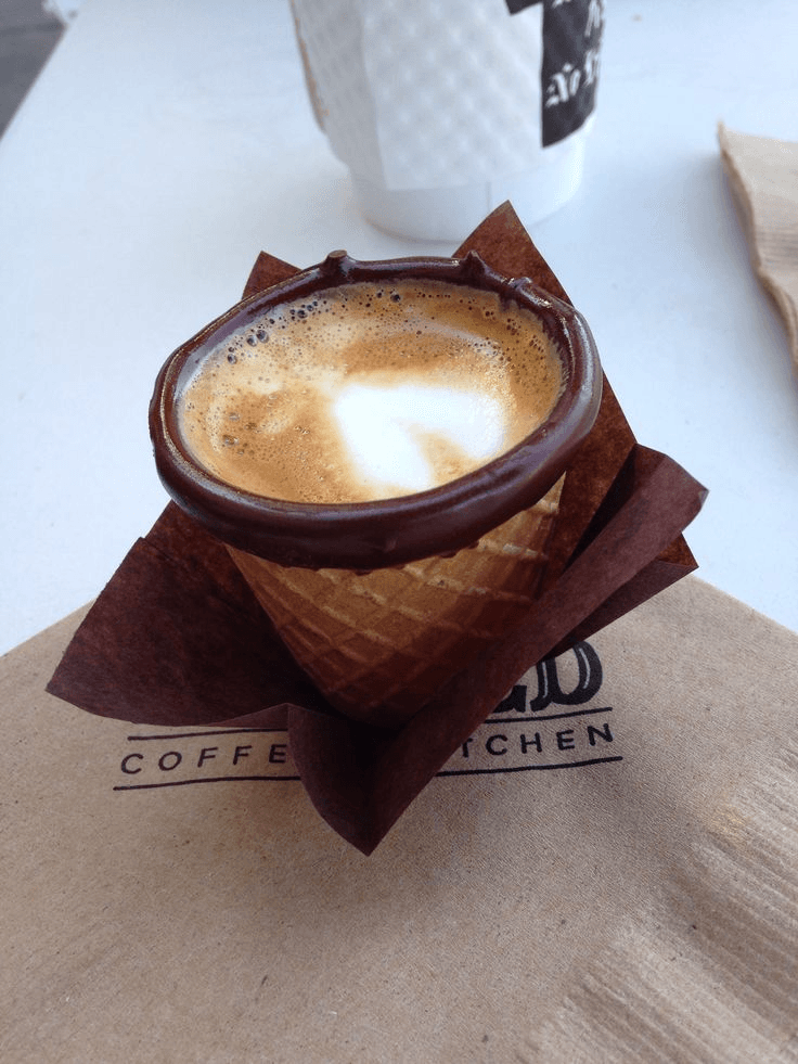 Edible coffee cup placed on cafe napkin