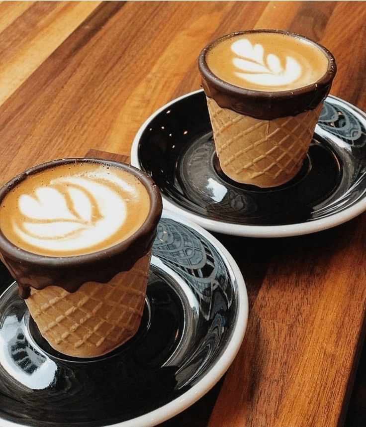 Two edible coffee cups on a table